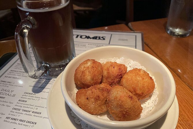 Washington's Hidden Gems Food Tour with 6+ Tasty Bites - Stops and tastings: hummus, tacos, halfsmoke, and the secret bite